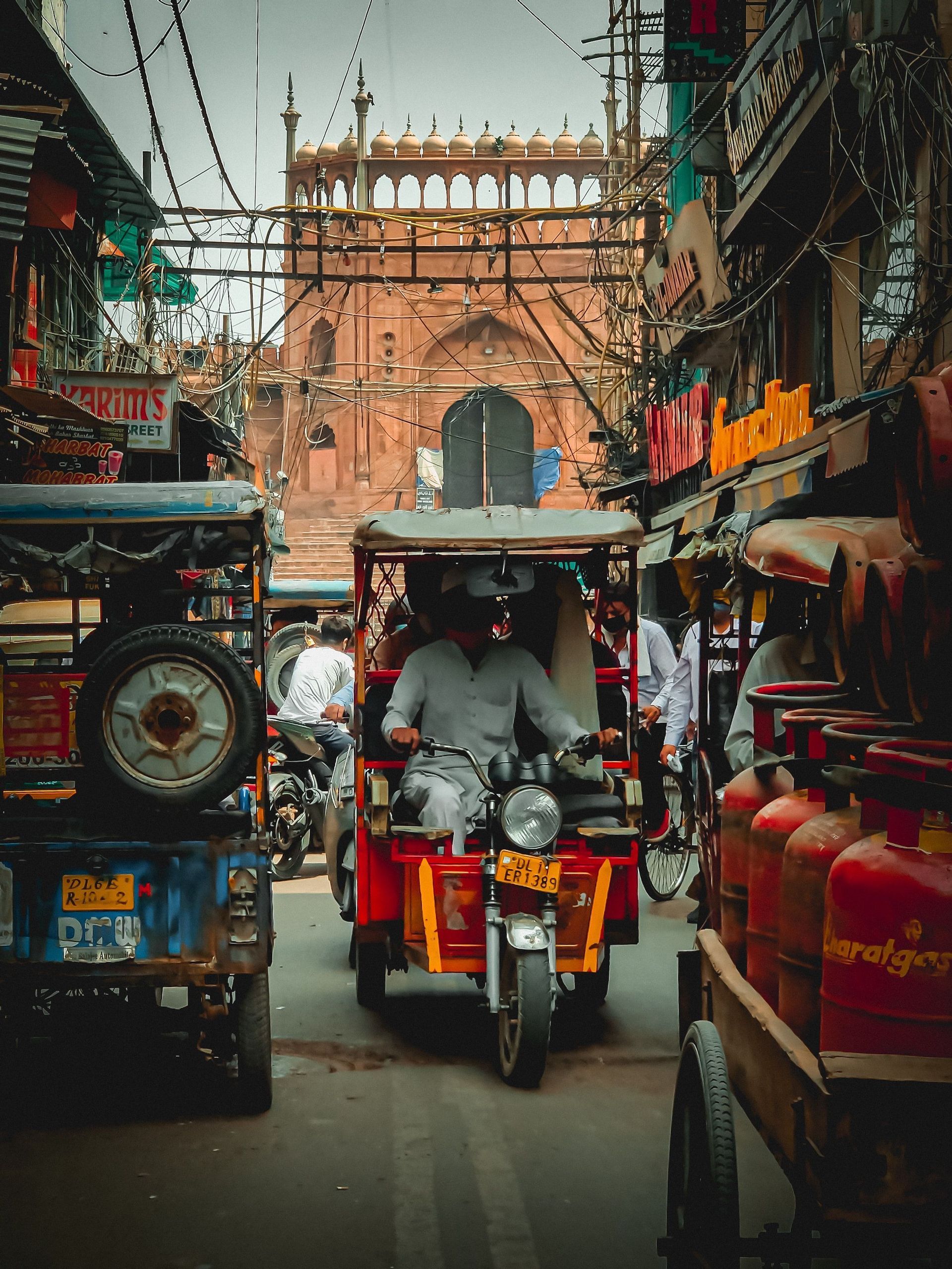 India-men-tuktuk-transport-traffic-city.jpg