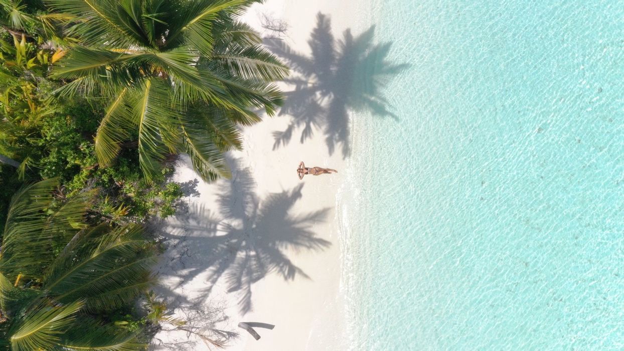 Maldives Beach Life: Five paradise islands among sharks, rays and dolphins