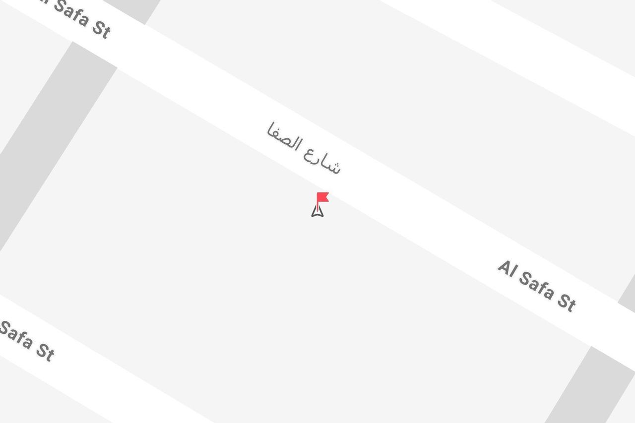 Una mappa minimalista che mostra un segnaposto su Al Safa Street, con il nome scritto sia in inglese che in arabo.