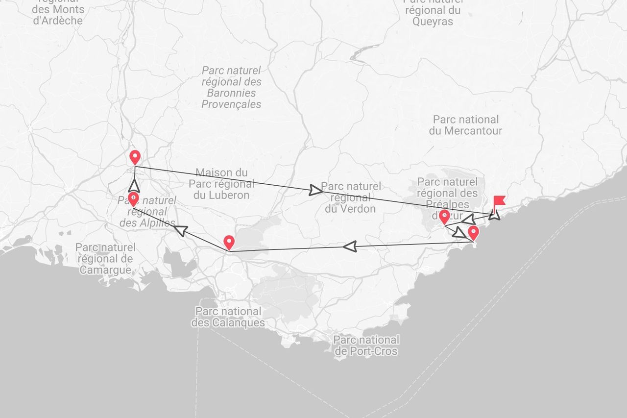 Eine Graustufenkarte einer Tourroute mit Wegpunkten durch die Naturparks der Provence, darunter Luberon, Verdon und Alpilles.