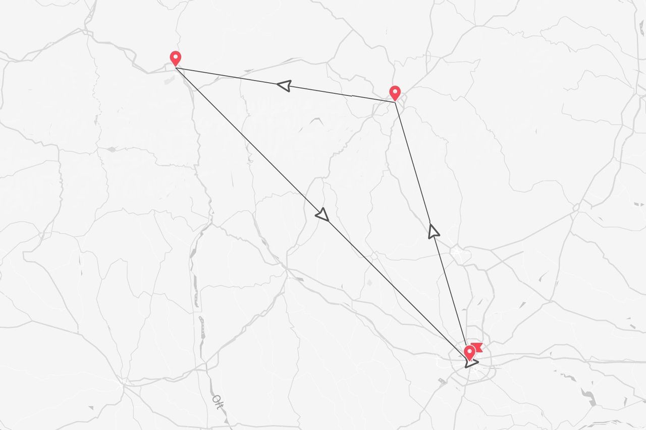Eine vereinfachte Karte zeigt eine Reiseroute mit vier durch rote Stecknadeln markierten Haltestellen, verbunden durch Linien mit Richtungspfeilen.