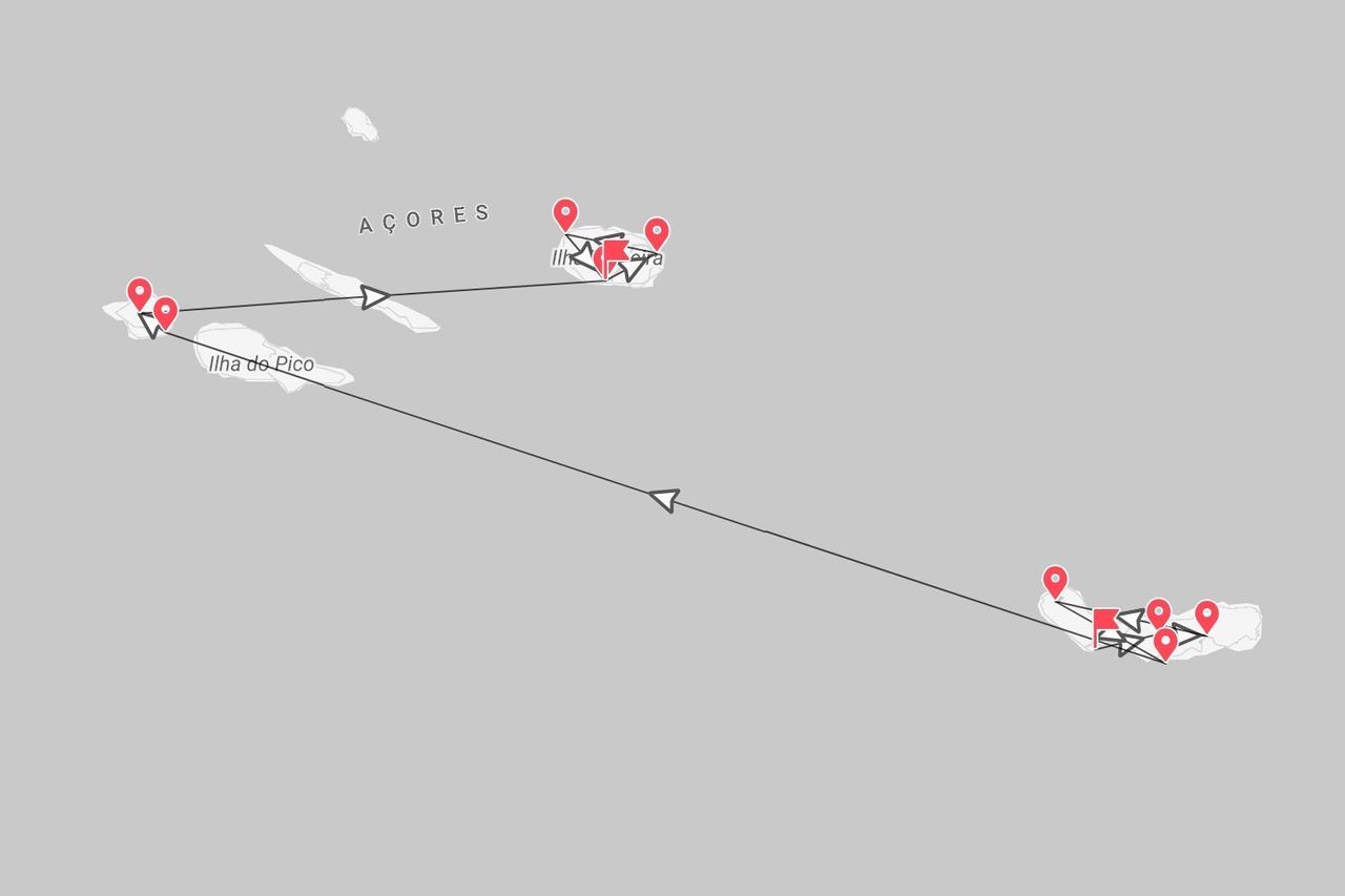 Une carte des Açores montrant un itinéraire de voyage avec des lignes et des épingles rouges reliant plusieurs îles, y compris l'île de Pico.