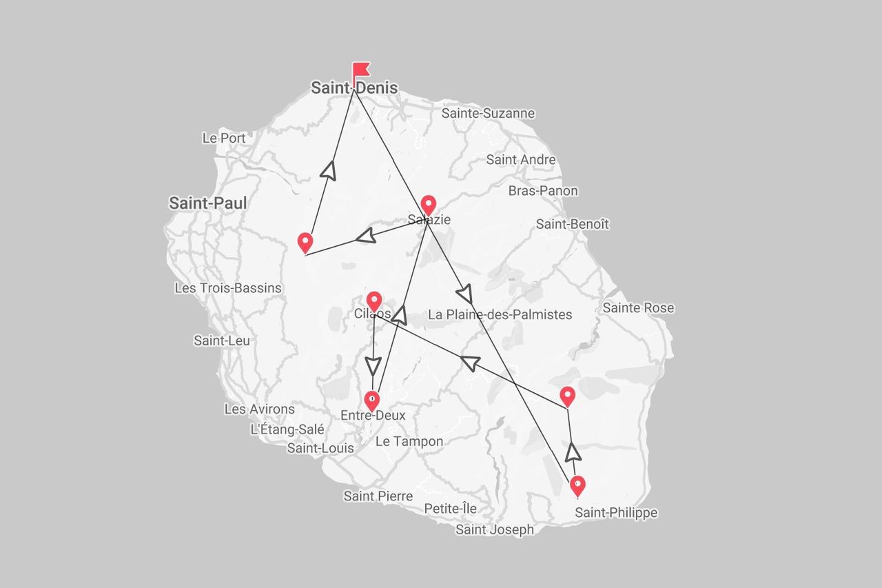 Une carte de l'île de La Réunion montrant un itinéraire de voyage avec des arrêts marqués dans des villes telles que Saint-Denis, Salazie et Cilaos.