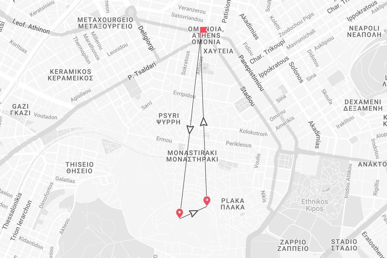 Un mapa en escala de grises de Atenas que muestra una ruta a pie por los barrios de Omonia, Monastiraki y Plaka.