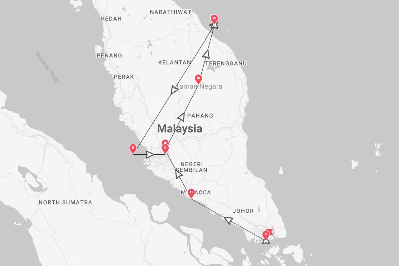 Una mappa della Malesia che mostra un itinerario di viaggio. Il percorso collega diverse località, tra cui Taman Negara e Malacca, attraverso la penisola.