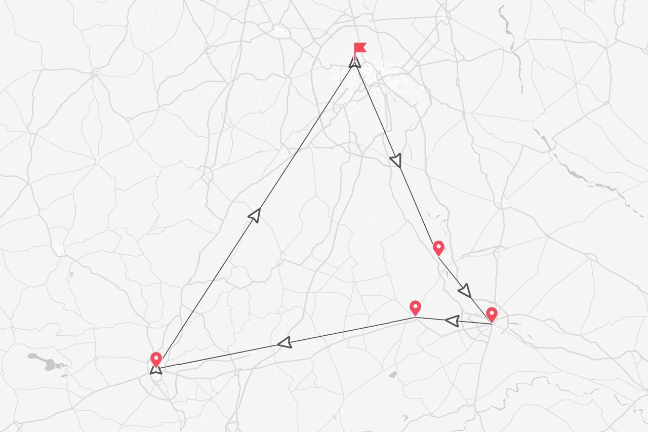 Una mappa stilizzata che mostra un itinerario di viaggio triangolare contrassegnato da segnaposto rossi e frecce direzionali.