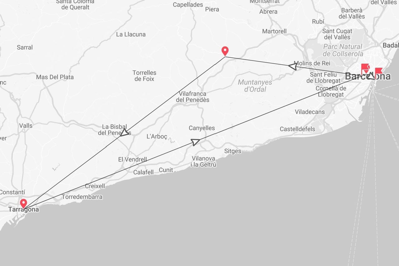 Una mappa in bianco e nero della Catalogna, Spagna, che mostra un itinerario di viaggio con tappe segnate che collega Barcellona e Tarragona.