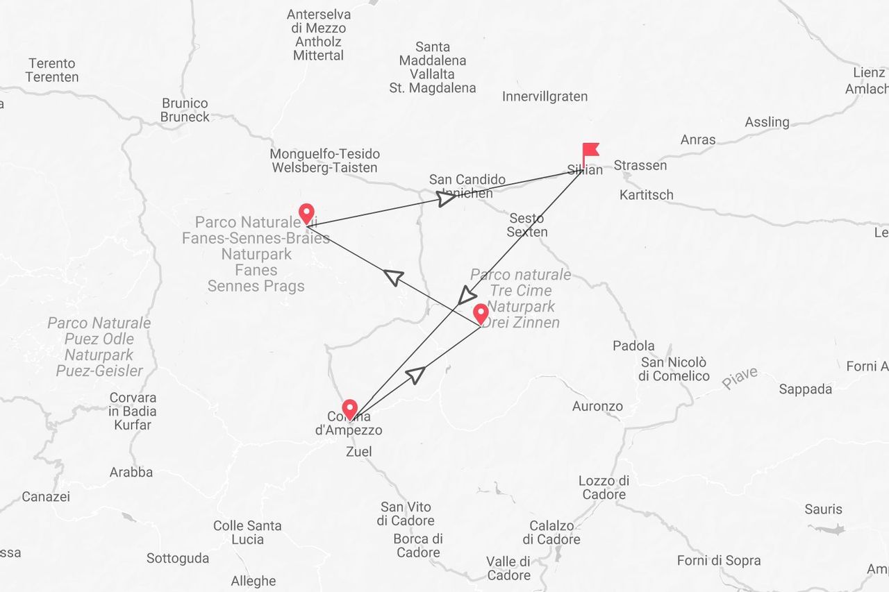 Una mappa che mostra un itinerario di viaggio con tappe a Parco Naturale Fanes-Sennes-Braies, Sillian, Parco Naturale Tre Cime e Cortina d'Ampezzo.