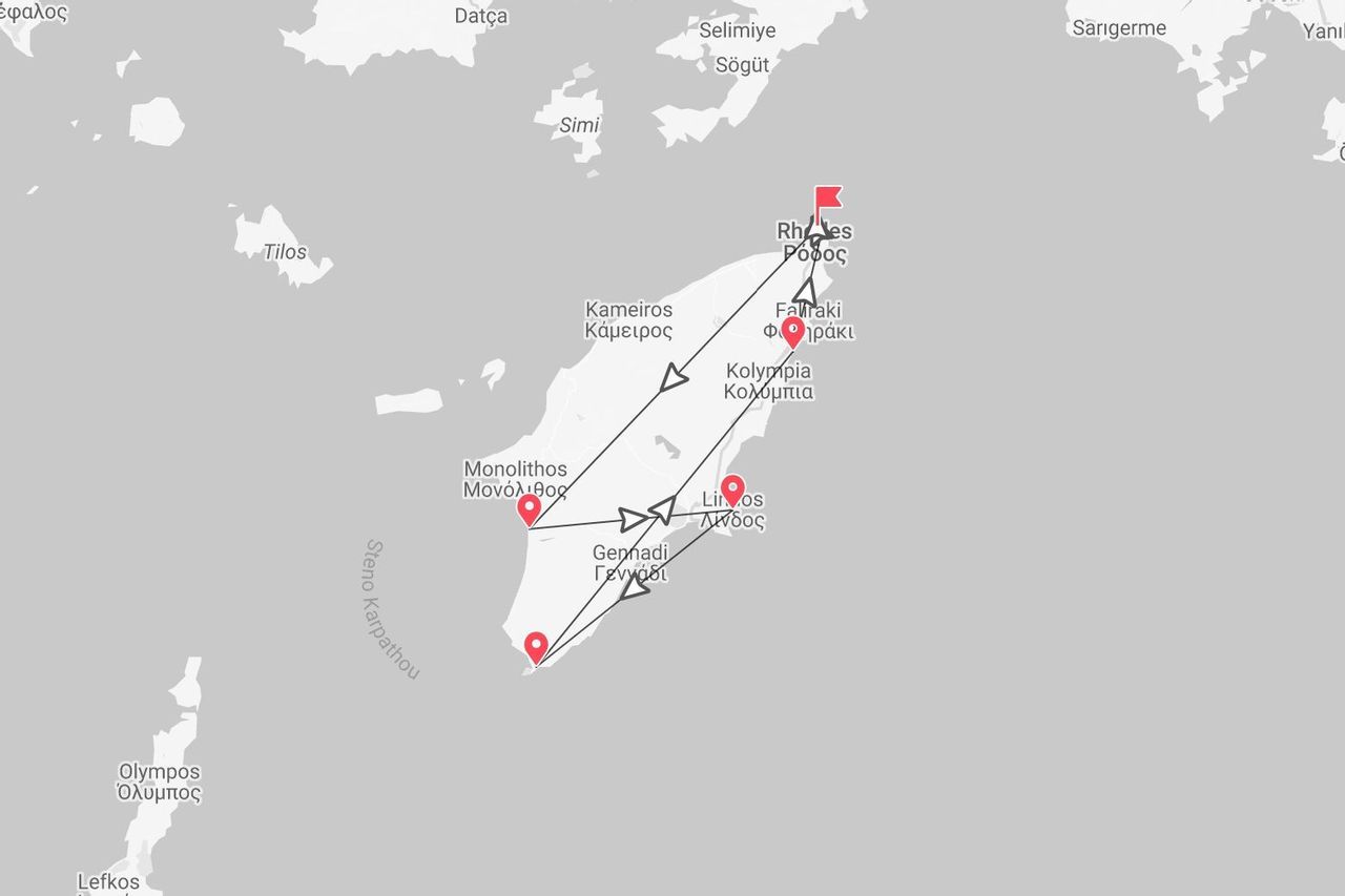 Una mappa di un itinerario di viaggio sull'isola di Rodi, Grecia, che mostra un percorso che collega località come Lindos e Monolithos.