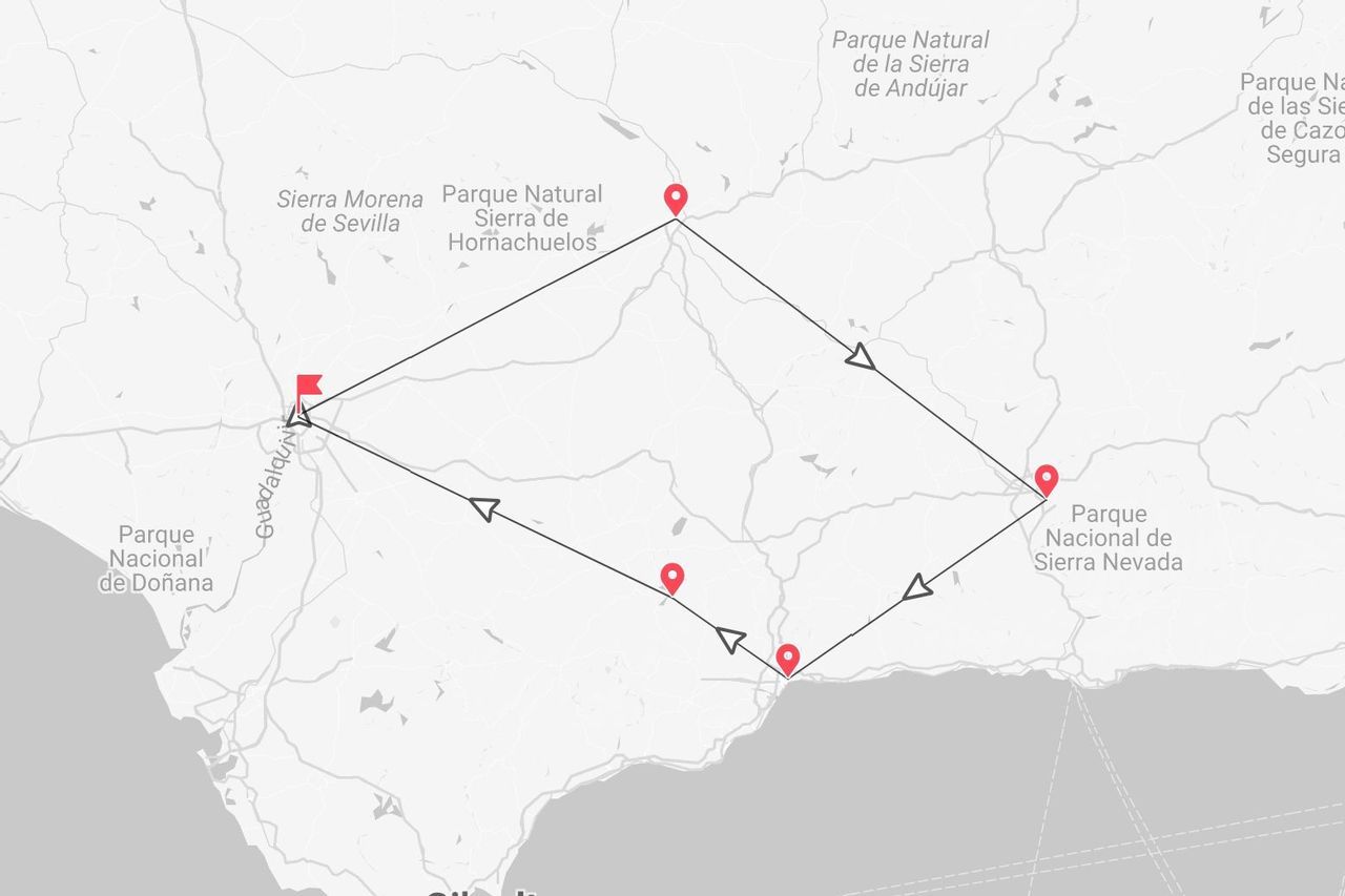 Une carte de l'Andalousie, Espagne, montrant un itinéraire de voyage reliant les parcs nationaux de la Sierra Nevada, de la Sierra Morena et de Doñana.