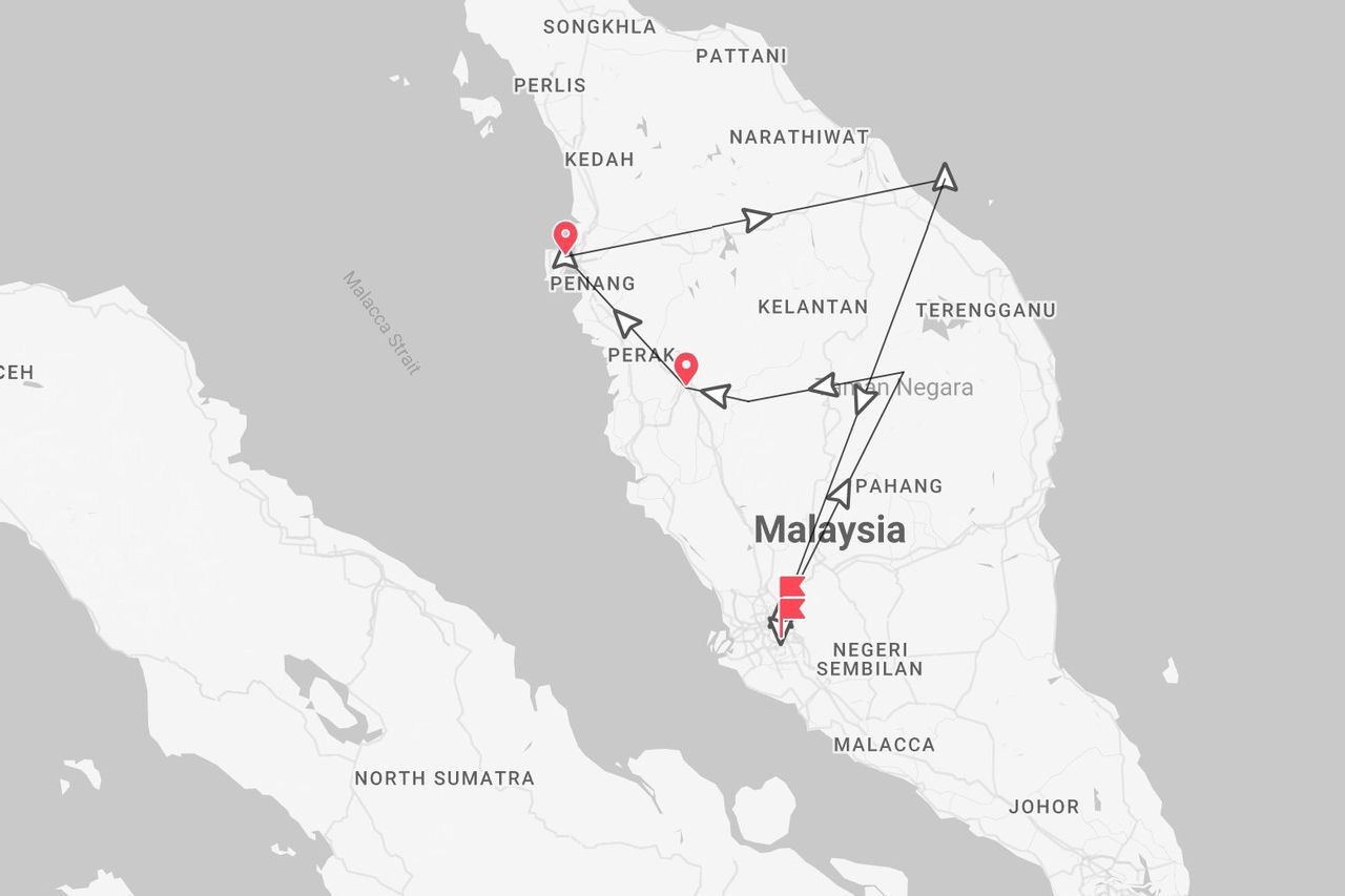Una mappa della Malesia che mostra un itinerario di viaggio attraverso Penang, Perak, Taman Negara e Pahang.
