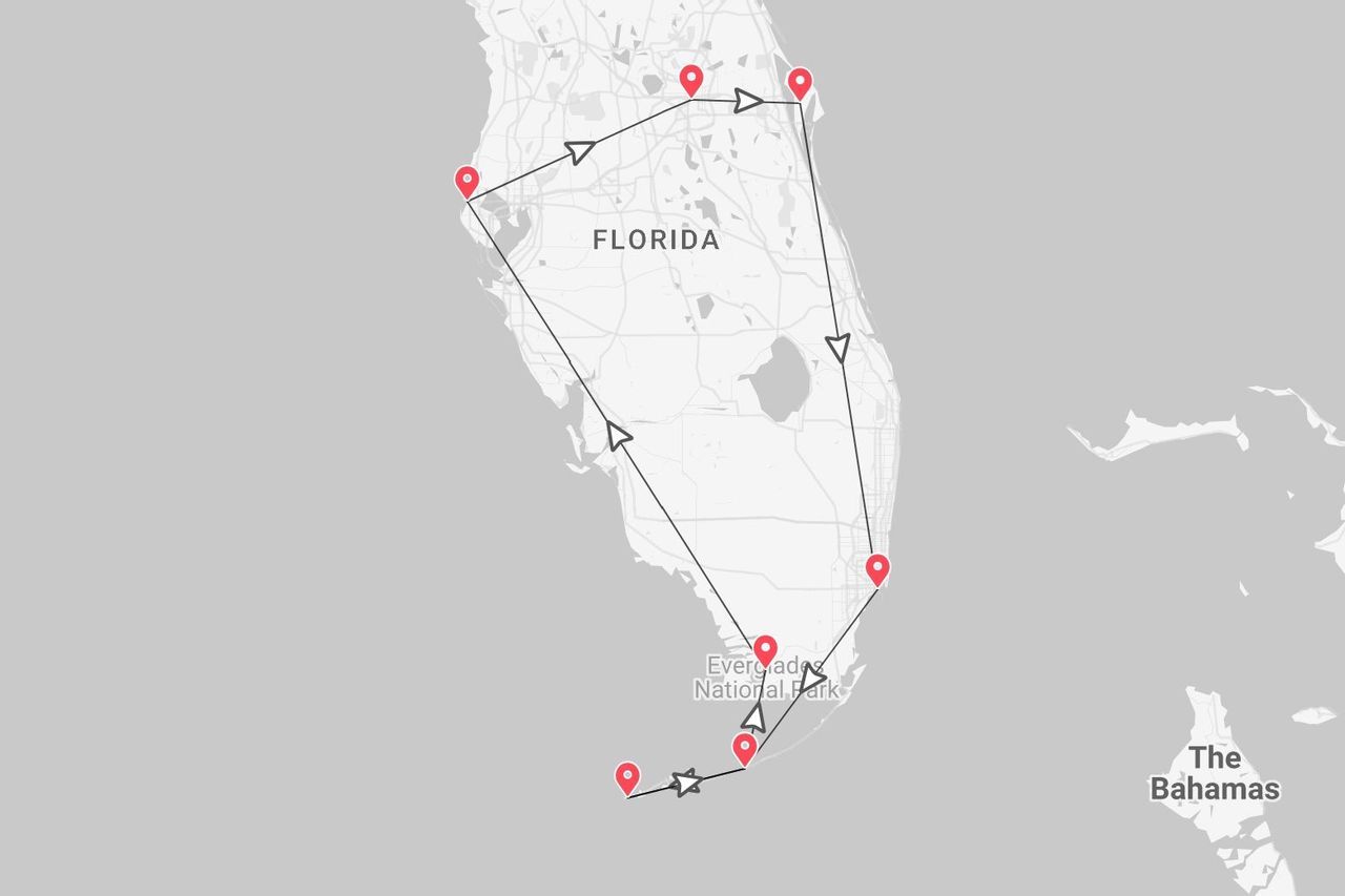 Un mapa minimalista de Florida que muestra un itinerario de viaje con chinchetas rojas marcando las paradas, incluyendo el Parque Nacional Everglades.