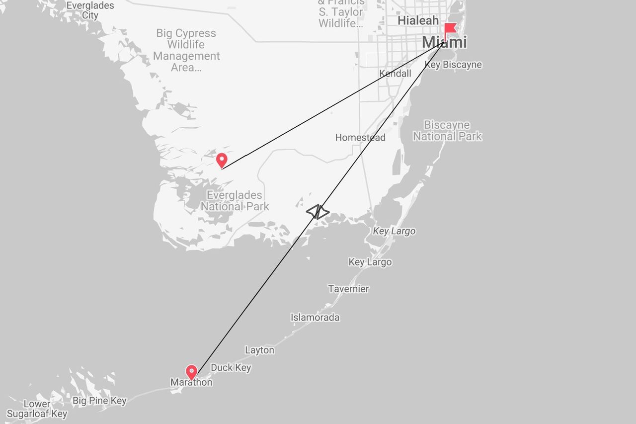 Una mappa che mostra un itinerario di viaggio in Florida, partendo da Miami, attraversando il Parco Nazionale delle Everglades e poi fino a Marathon.