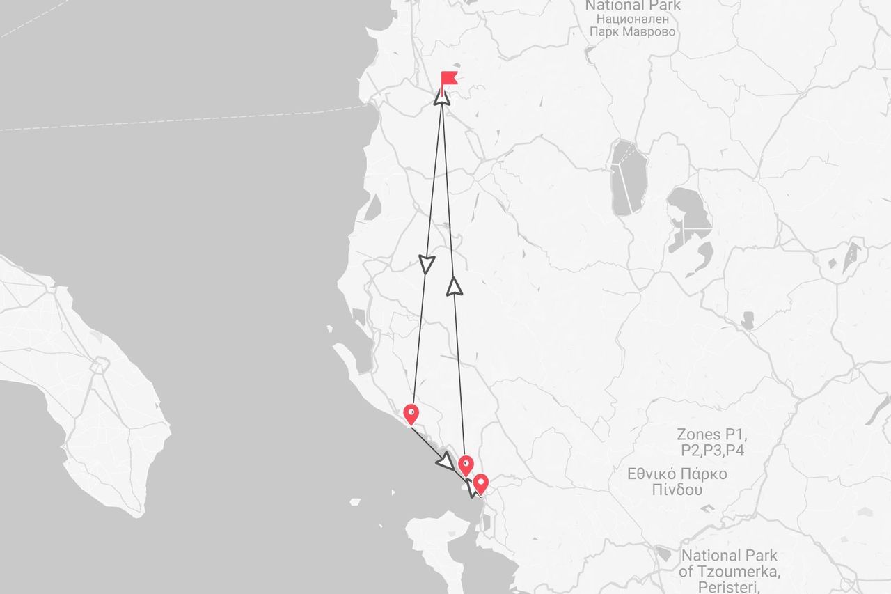 Mappa di un itinerario di viaggio nei Parchi Nazionali di Mavrovo e Tzoumerka, con puntine e frecce rosse.