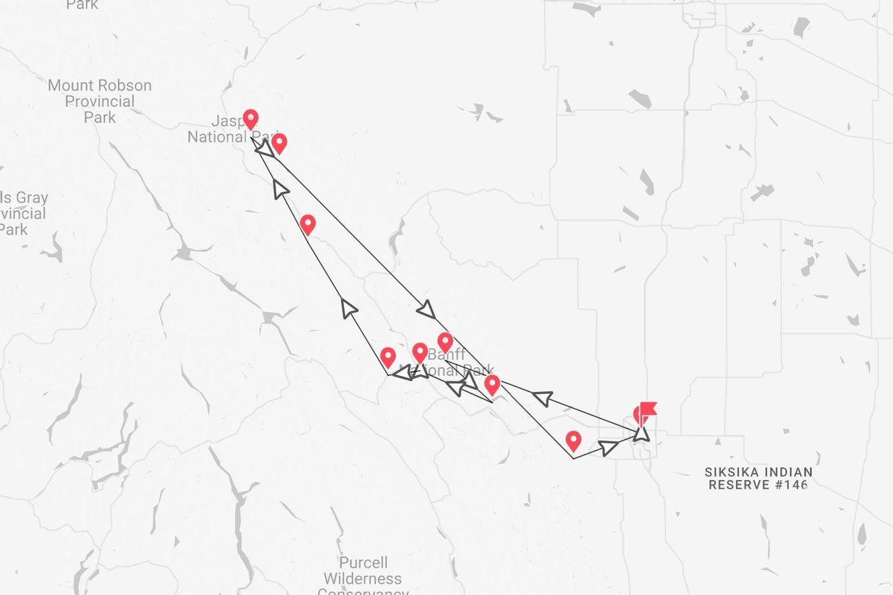 A map showing a travel route through Jasper National Park and Banff National Park in Canada.