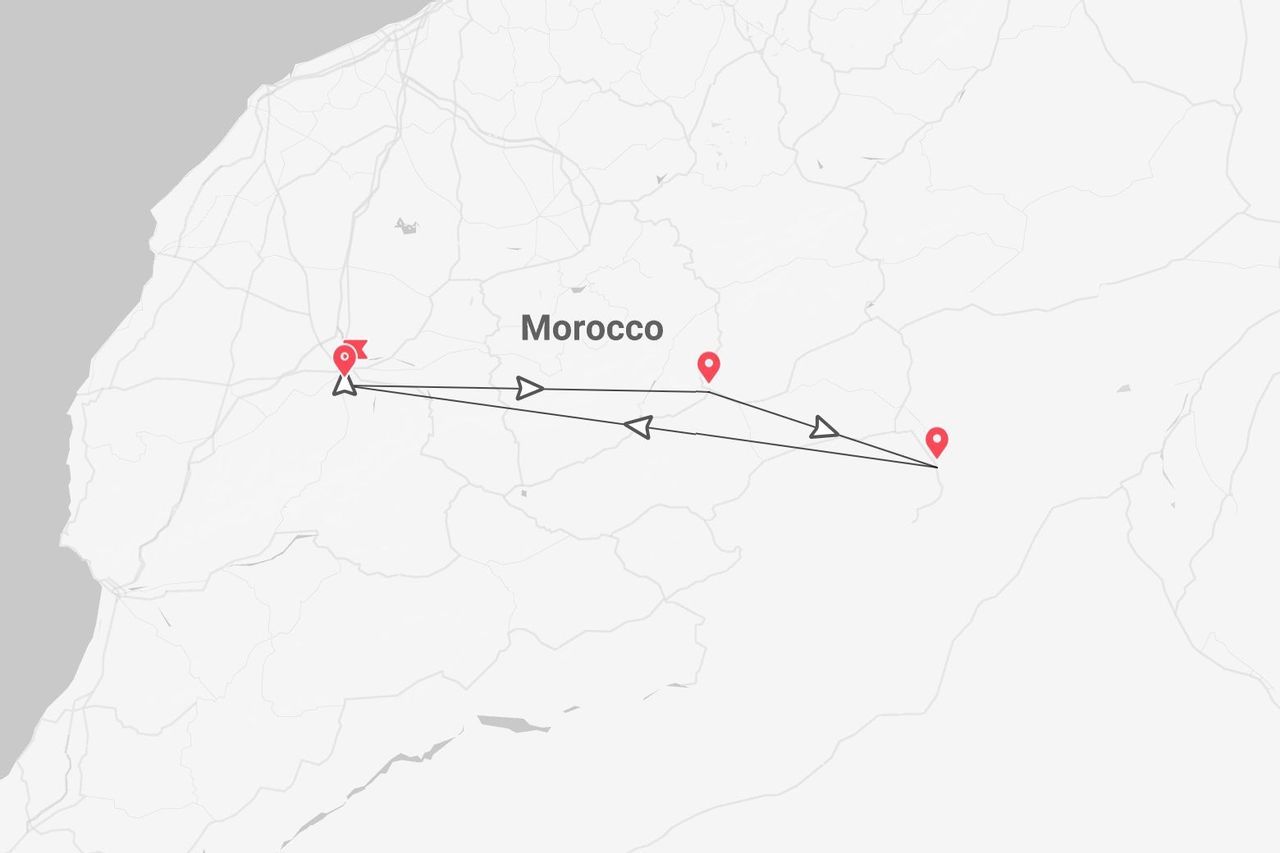 Mappa di un itinerario di viaggio in Marocco, con puntini rossi e percorso ad anello.