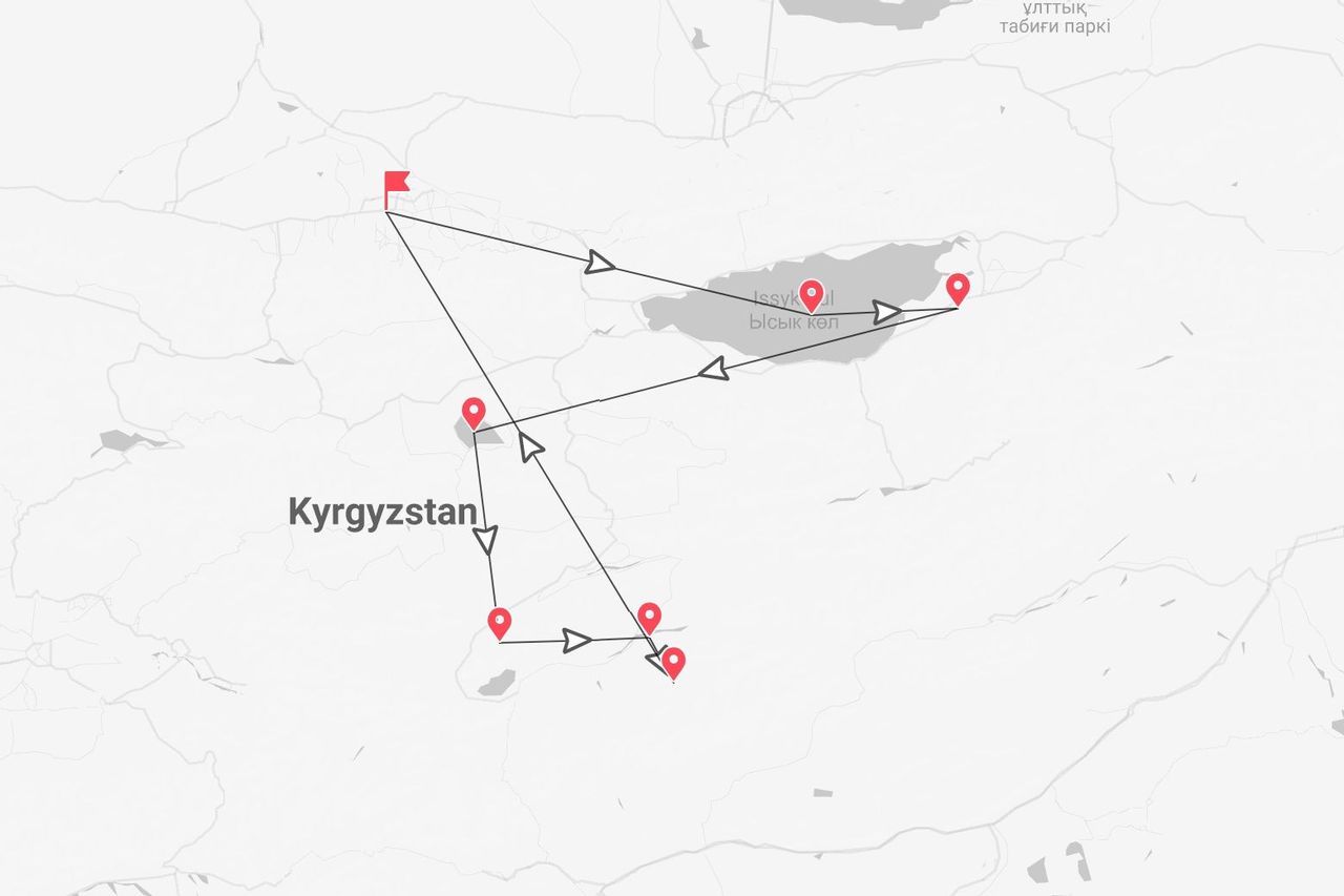 Una mappa che mostra un itinerario di viaggio attraverso il Kirghizistan, con punti segnati attorno al lago Issyk Kul.