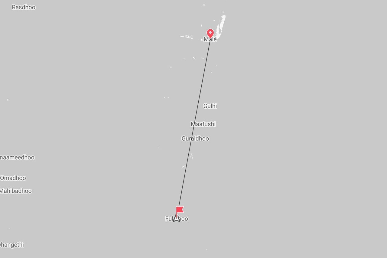 A map of the Maldives showing a travel route connecting the capital city Malé to the island of Fulidhoo.