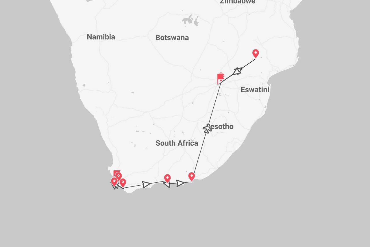 Una mappa dell'Africa meridionale che mostra un itinerario di viaggio attraverso il Sudafrica, con le tappe segnate da puntine rosse e i percorsi di volo indicati.