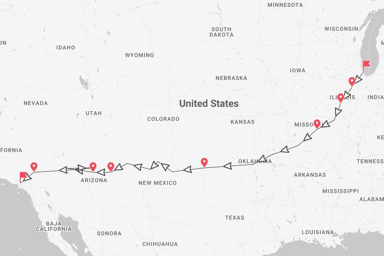 Une carte des États-Unis montrant un itinéraire de voyage marqué d'une ligne et d'épingles de Chicago, Illinois à Los Angeles, Californie.