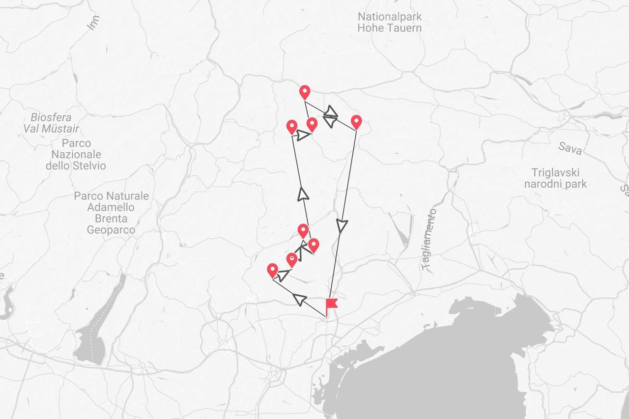 A map showing a travel itinerary through the Eastern Alps, passing near parks like Triglavski, Hohe Tauern, and Stelvio.