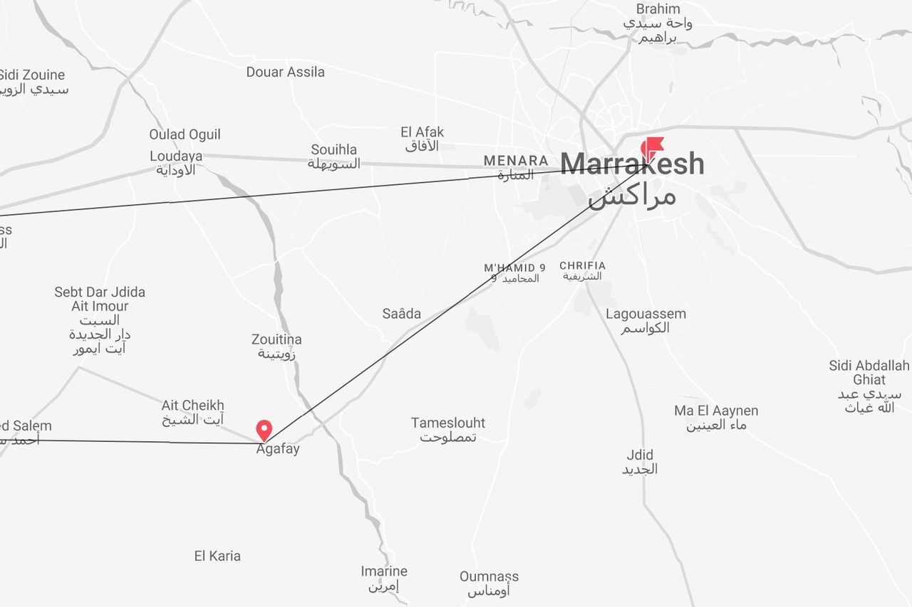 A map showing a route between the city of Marrakesh and the town of Agafay in Morocco, with place names in English and Arabic.