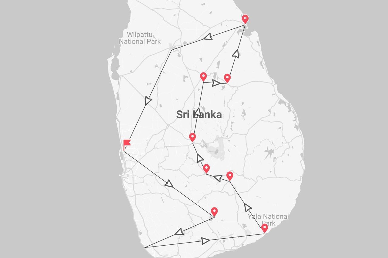 Una mappa di un itinerario di viaggio attraverso lo Sri Lanka, con il percorso mostrato da una linea e da puntine rosse attraverso i parchi nazionali di Wilpattu e Yala.