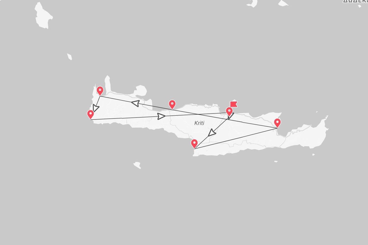 Un mapa de la isla de Creta con un itinerario de viaje marcado con chinchetas rojas y líneas.