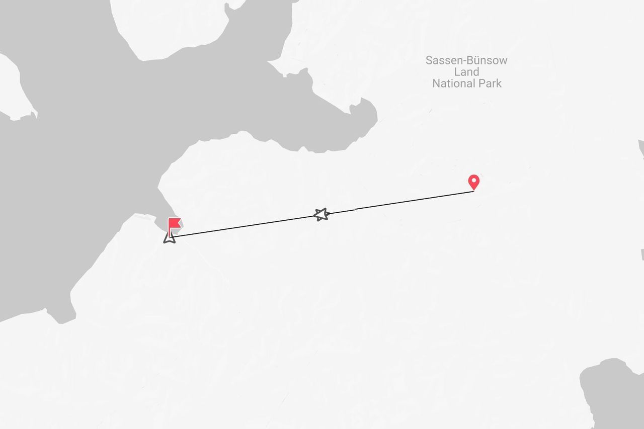 Una mappa semplificata che mostra un itinerario di viaggio con punti di inizio e fine vicino al Parco Nazionale di Sassen-Bünsow Land.