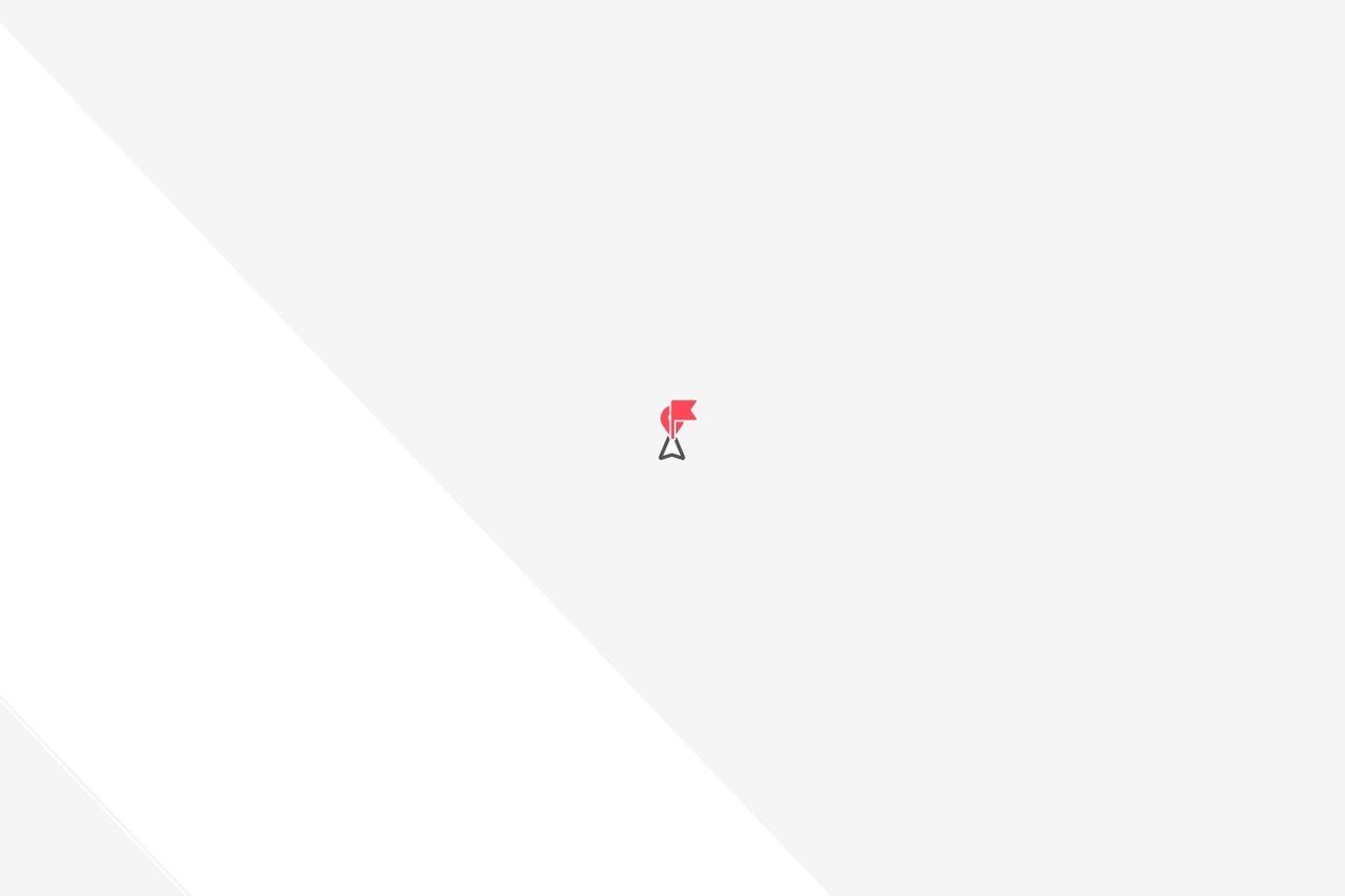 Un'icona a spillo di bandiera rossa, piccola, su uno sfondo minimalista bianco e grigio chiaro.