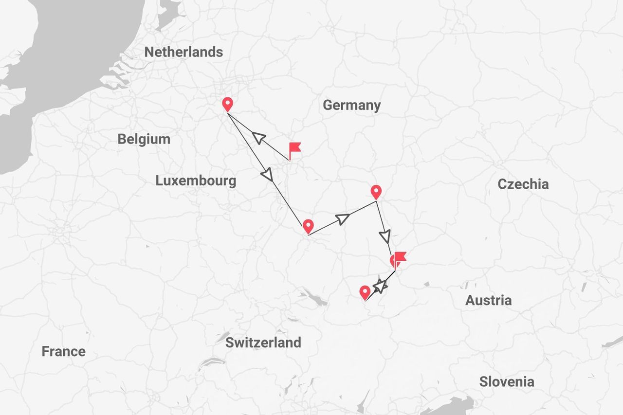 A map of Central Europe showing a travel route with red pins through Germany and into Austria.
