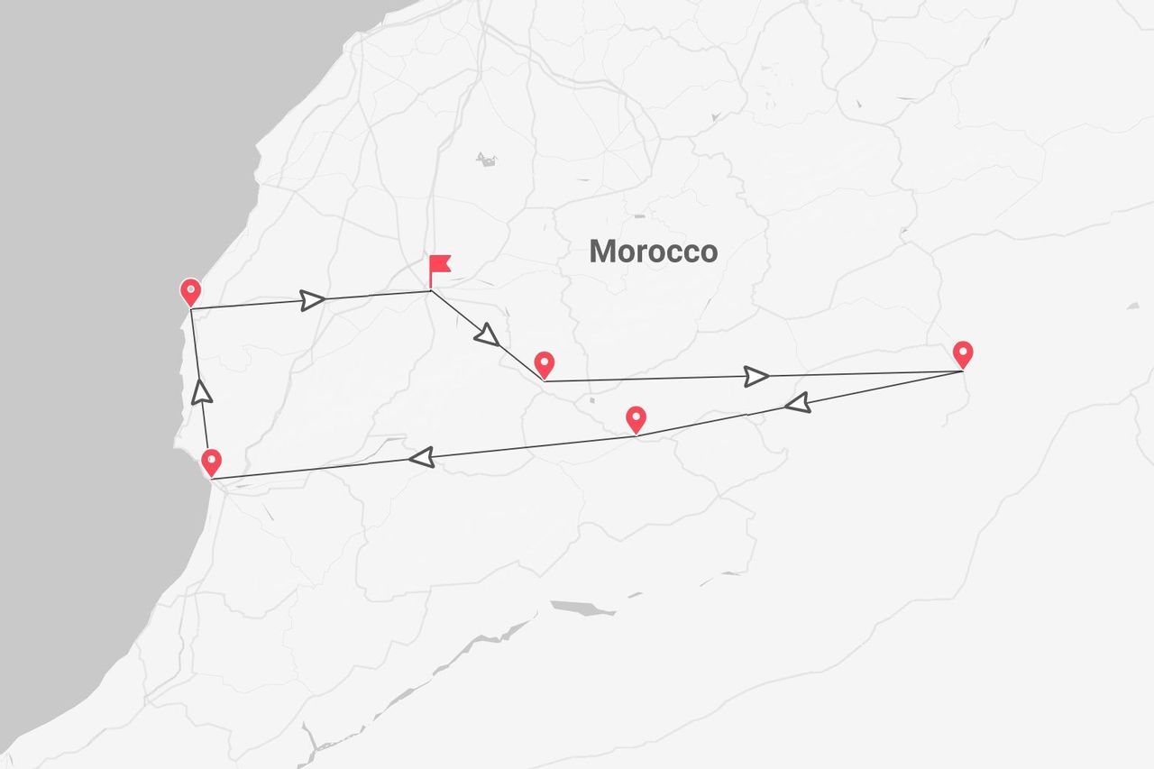 Mappa di un itinerario di viaggio in Marocco, con linea, frecce e segnaposto rossi.