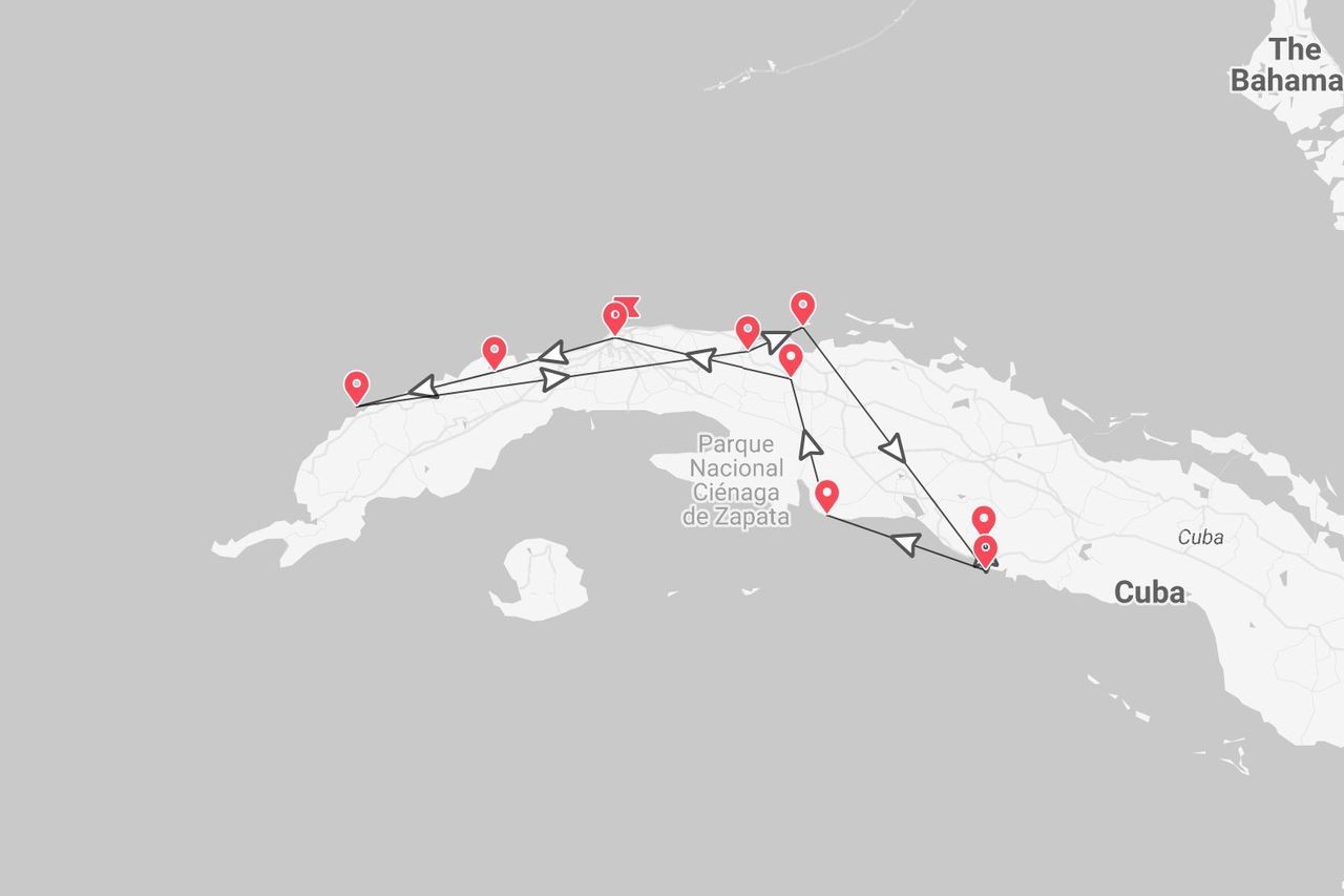 Une carte de Cuba montrant un itinéraire de voyage marqué par des épingles rouges et une ligne noire, passant près du Parc National Ciénaga de Zapata.