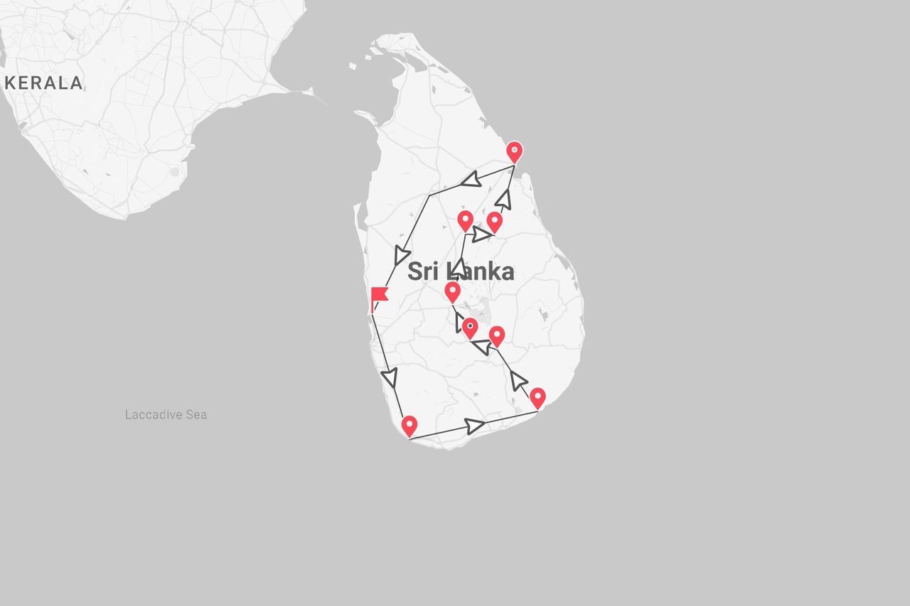 A map of Sri Lanka showing a travel itinerary with a line and red pins marking the route around the island.