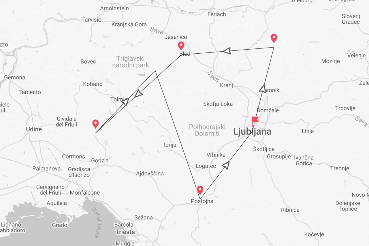 Eine Karte mit einer Reiseroute durch Slowenien, die Städte wie Ljubljana, Bled, Tolmin und Postojna verbindet.