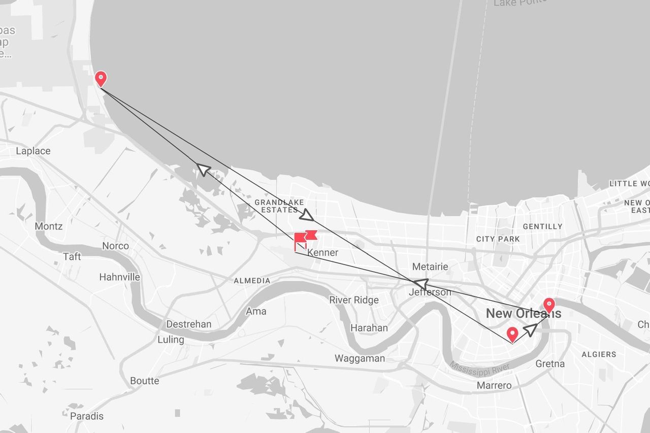 A black and white map showing a travel itinerary in Louisiana, with a route connecting Laplace, Kenner, and New Orleans.
