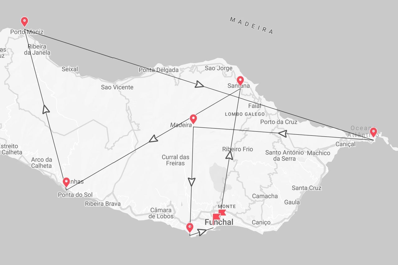 Una mappa che mostra un itinerario turistico intorno all'isola di Madeira, con tappe fondamentali tra cui Funchal, Ponta do Sol, Porto Moniz e Santana.