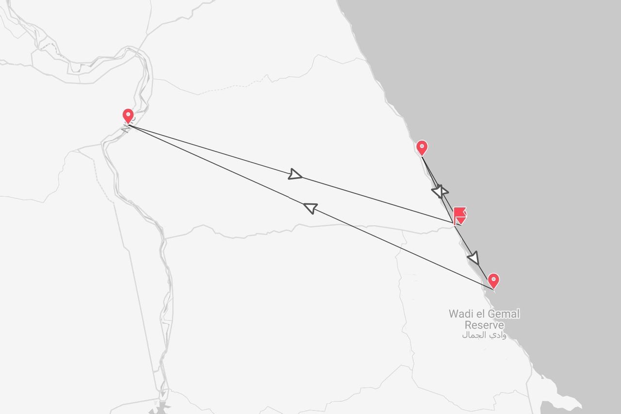 Una mappa che illustra un itinerario di viaggio con segnaposto rossi lungo una costa vicino alla Riserva di Wadi el Gemal e un fiume interno.