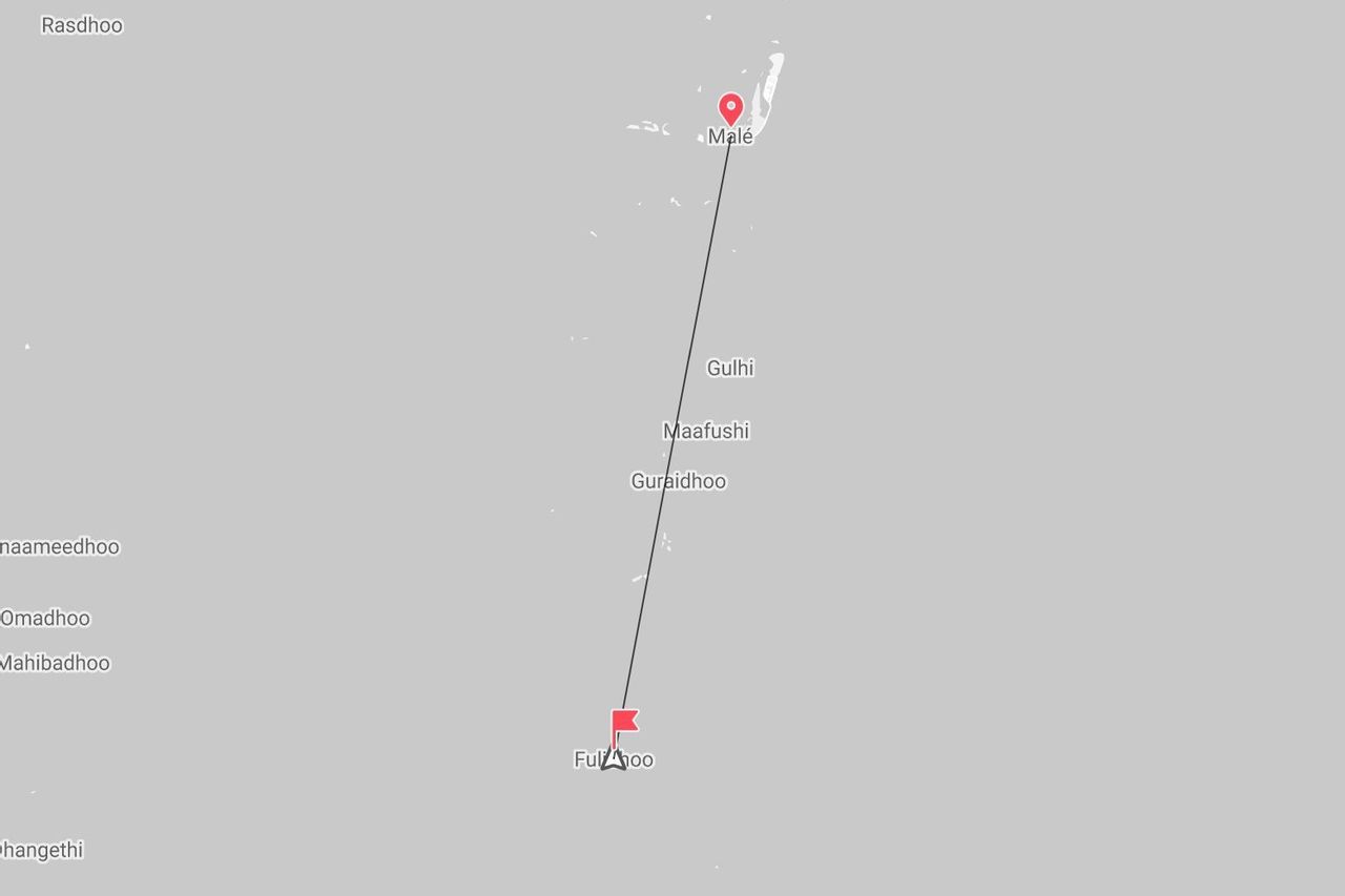 A map of the Maldives showing a travel route from Malé to Fulidhoo, passing by the islands of Gulhi and Maafushi.