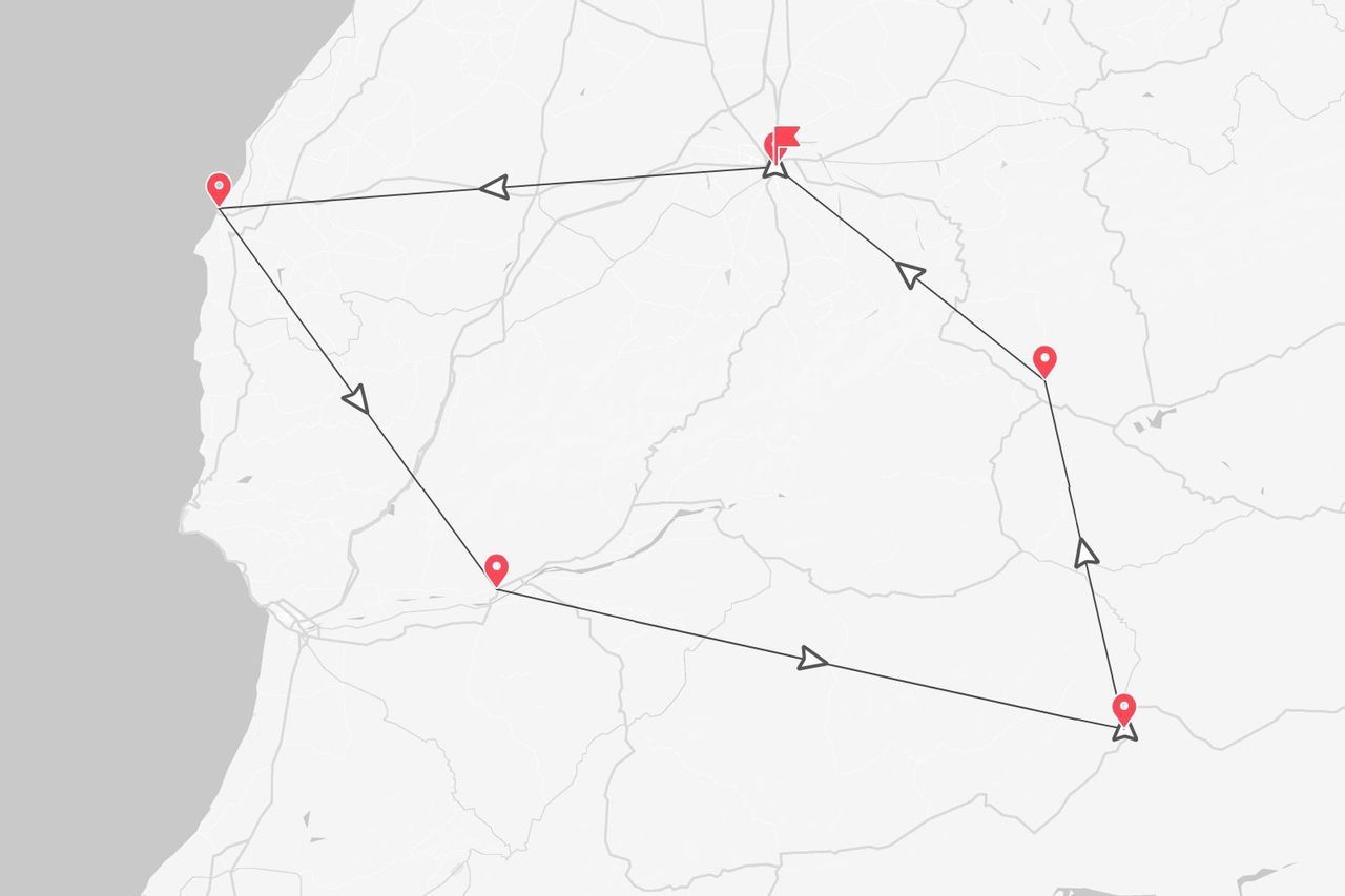 Una mappa semplificata che mostra un itinerario di viaggio contrassegnato da puntine rosse e linee di collegamento.