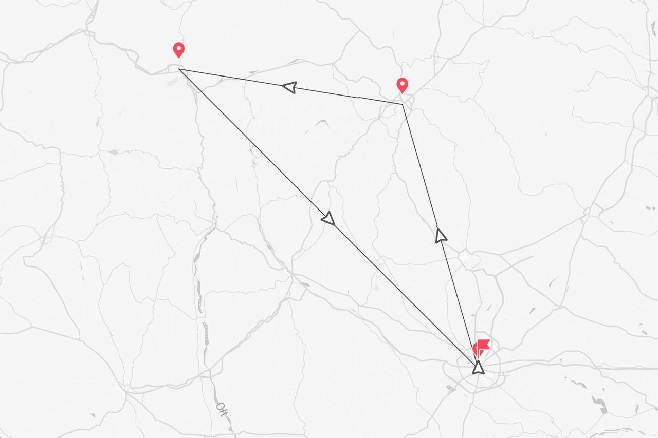 Un mapa estilizado que muestra un itinerario de viaje con cuatro paradas marcadas por pines rojos y una bandera, conectadas por flechas direccionales.