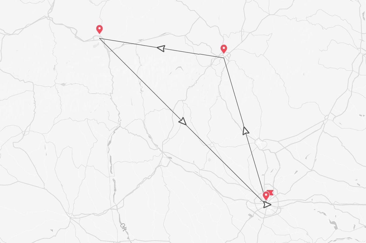 Mappa stilizzata grigia e bianca che illustra un itinerario di viaggio collegando tre località con segnaposto rossi e linee direzionali nere.