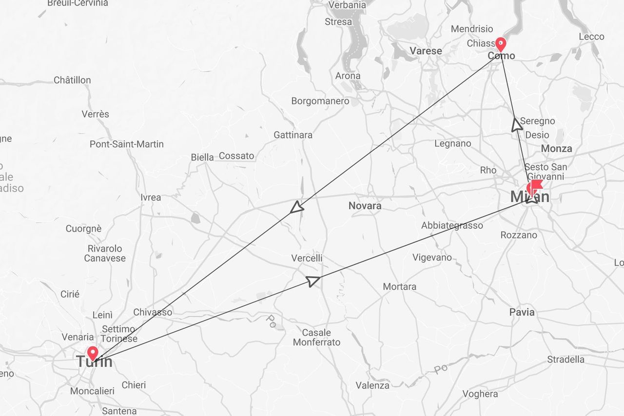 A map of northern Italy showing a triangular travel route connecting the cities of Milan, Como, and Turin.