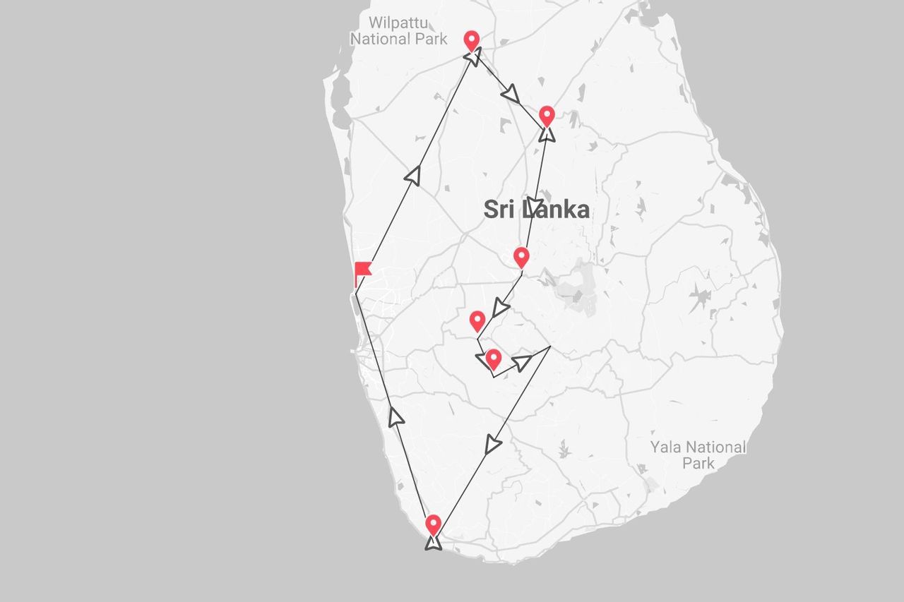Eine Karte von Sri Lanka, die eine Reiseroute zeigt, markiert mit einer schwarzen Linie und roten Stecknadeln, vorbei an den Nationalparks Wilpattu und Yala.