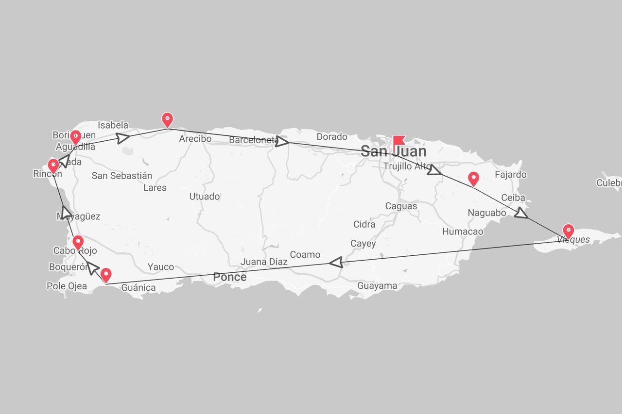A map of Puerto Rico showing a travel itinerary connecting San Juan, Arecibo, Rincon, Ponce, and the island of Vieques.