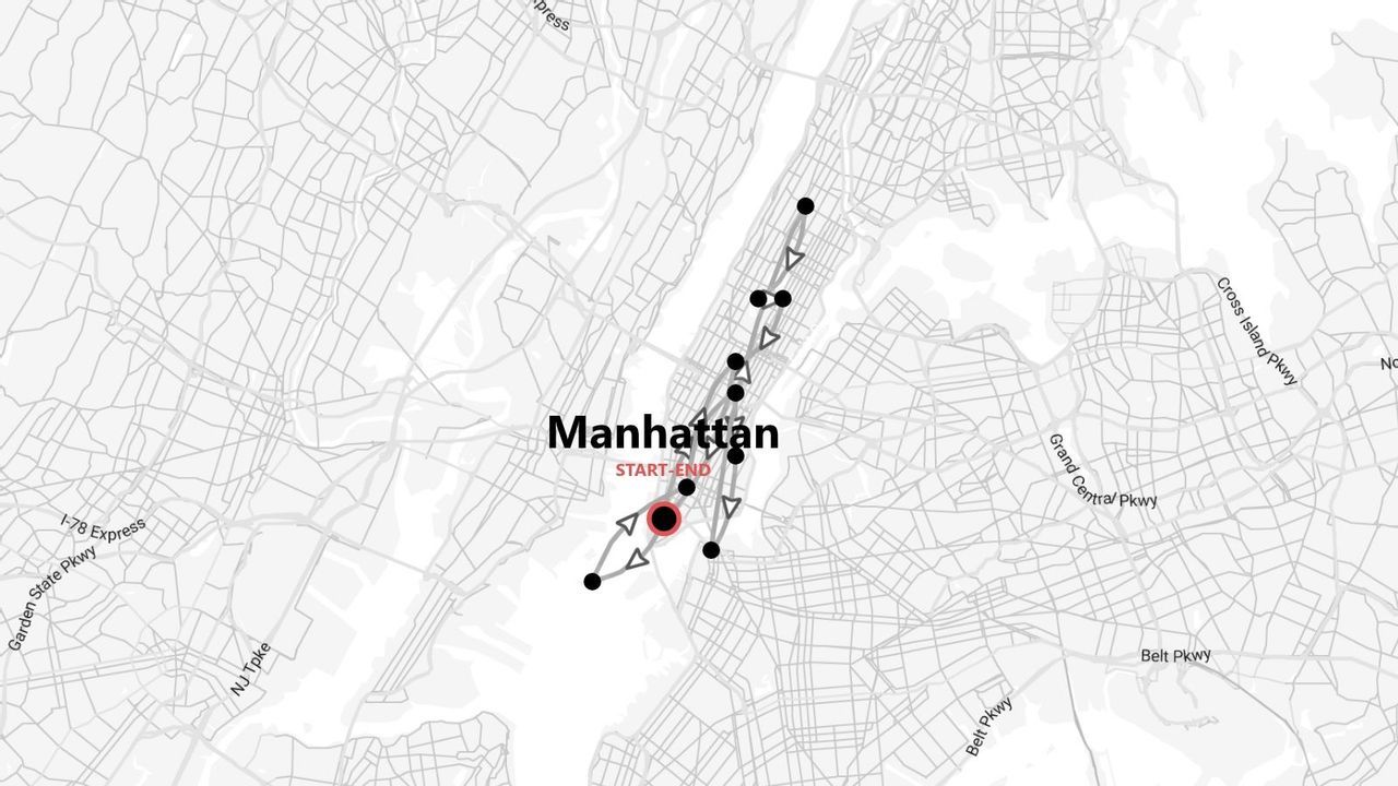 A grayscale map showing a travel route marked with start and end points through Manhattan, New York.