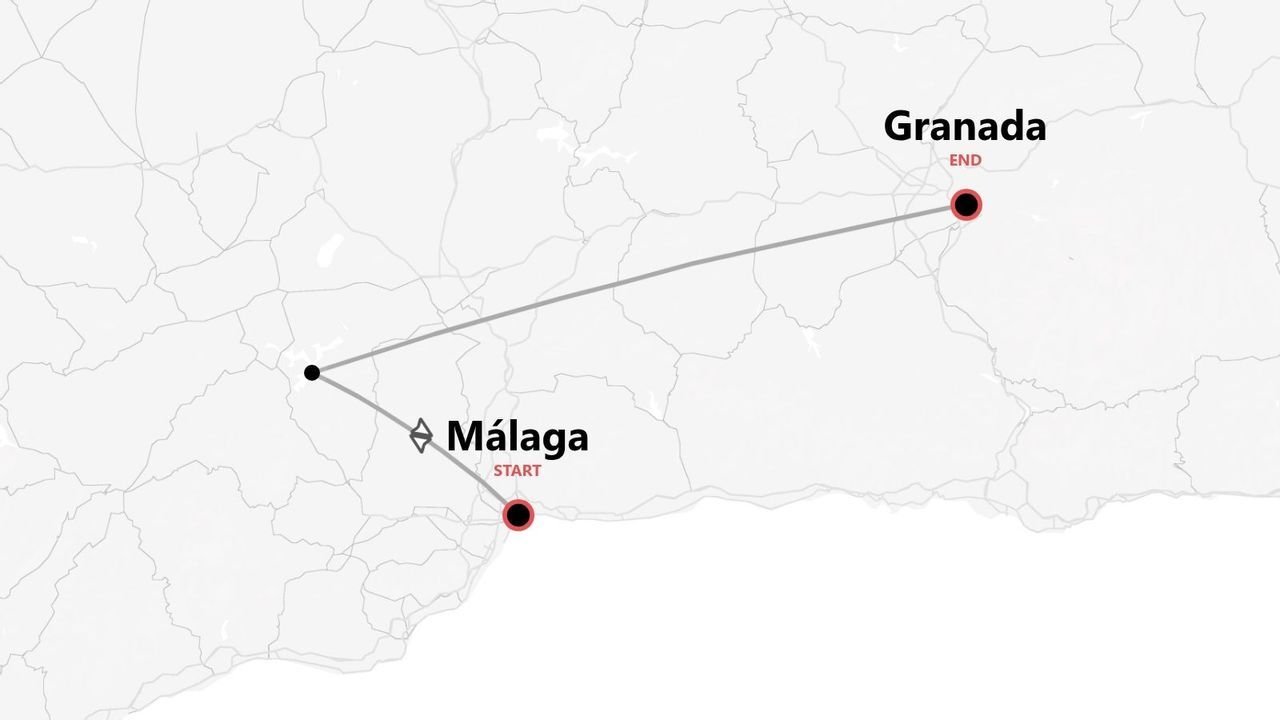 Un mapa gris sencillo con una ruta de viaje en España, de Málaga a Granada.