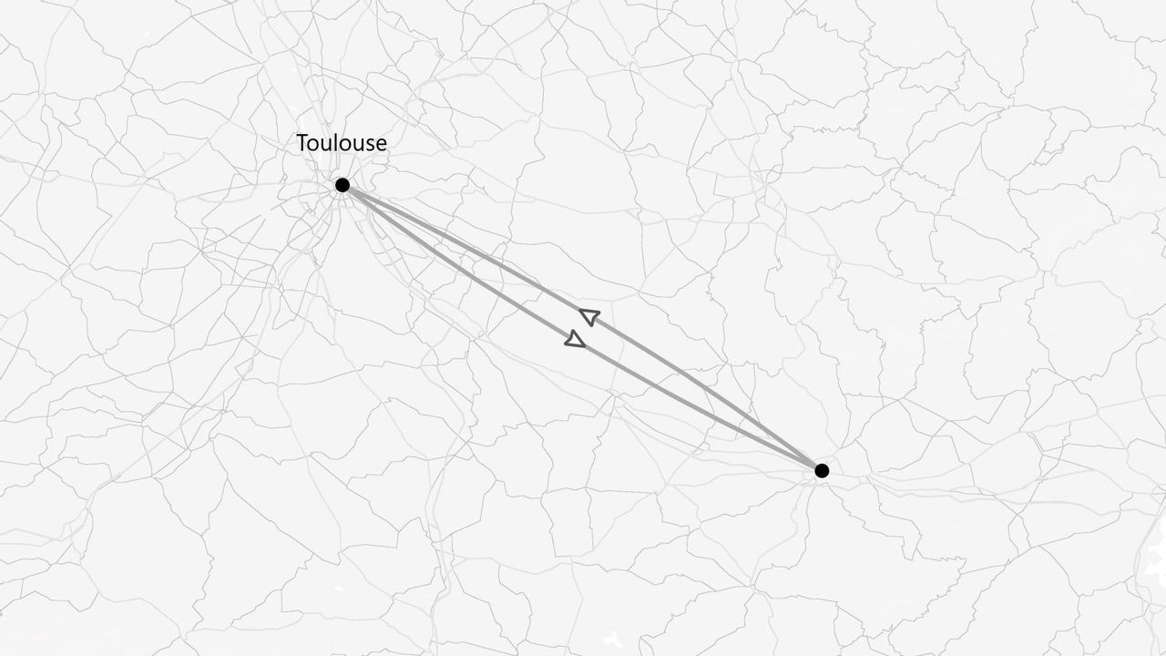 Une carte en noir et blanc montrant un itinéraire aller-retour entre Toulouse et un autre point sur un réseau routier.