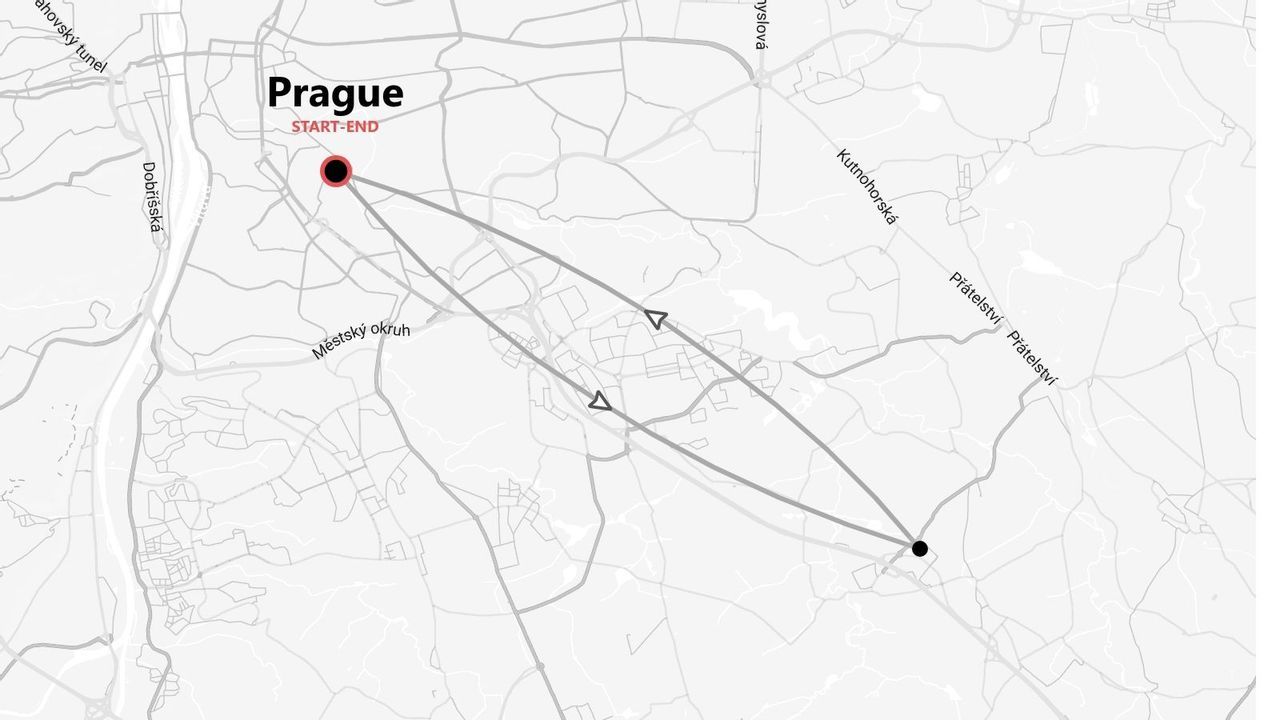 A black and white map of Prague showing a circular itinerary route that starts and ends in the city.