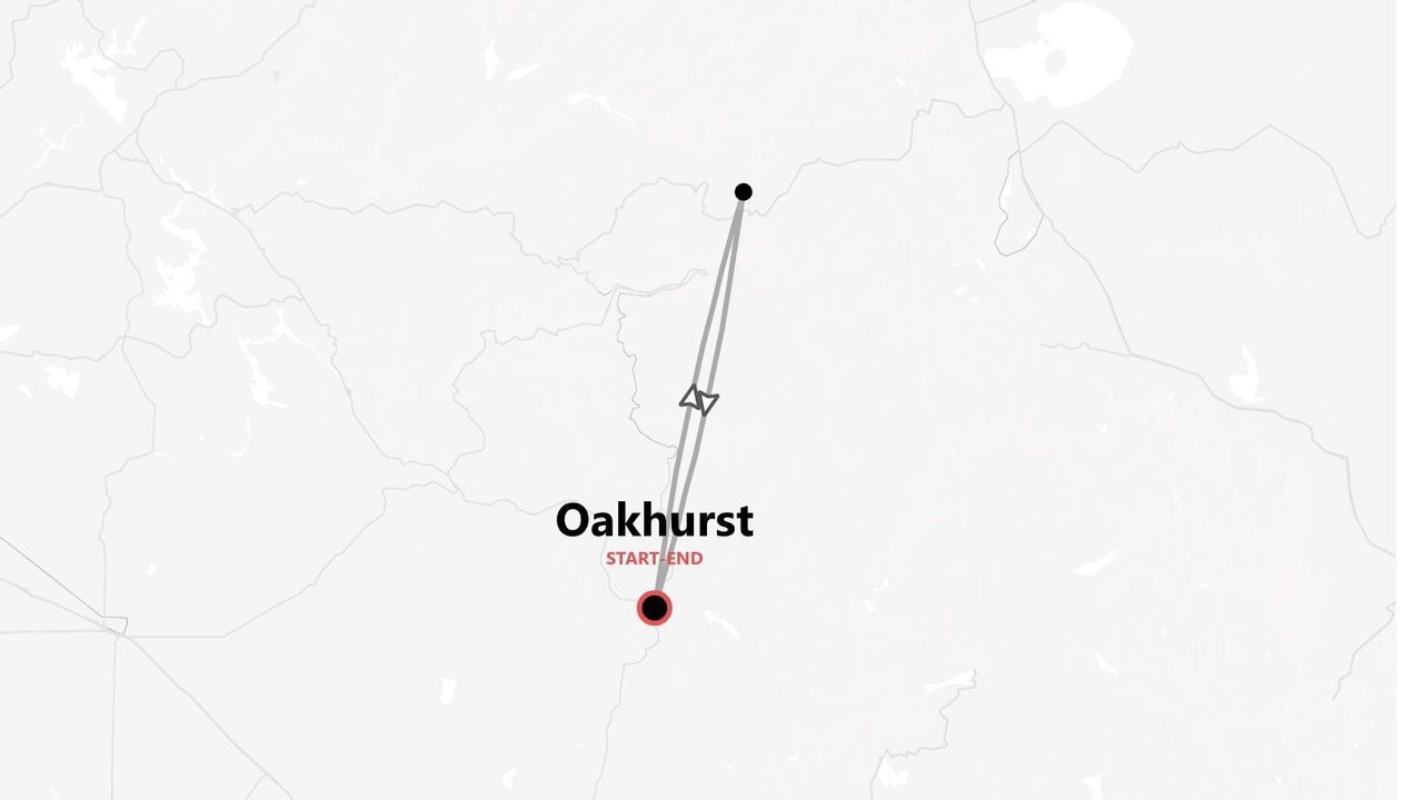 A minimalist map showing a travel route that starts and ends in Oakhurst, indicated by a red marker.